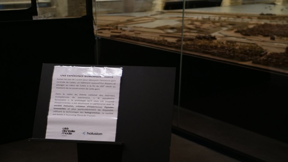 picture of a label in front of a piece of art