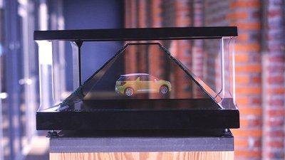 Prism The Prism is an holographic showcase that enables you to display holograms <b>visible over 360°</b> in its glass pyramid. It is a great solution if you want to promote your product in a store or an exhibition, with an innovative 3D display.
