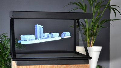 Iris 22 The Iris 22 is an holographic showcase that enables you to display visible holograms in a reduced space. It is a perfect solution if you want to promote your product in a store or an exhibition, with an innovative 3D display.