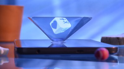 Pixel The Pixel is a small holographic pyramid specially designed for 4" to 6" smartphones. With this holographic device, you can display small holograms, visible over 360° thanks to an optical illusion which gives the impression of a 3D picture floating just above your smartphone